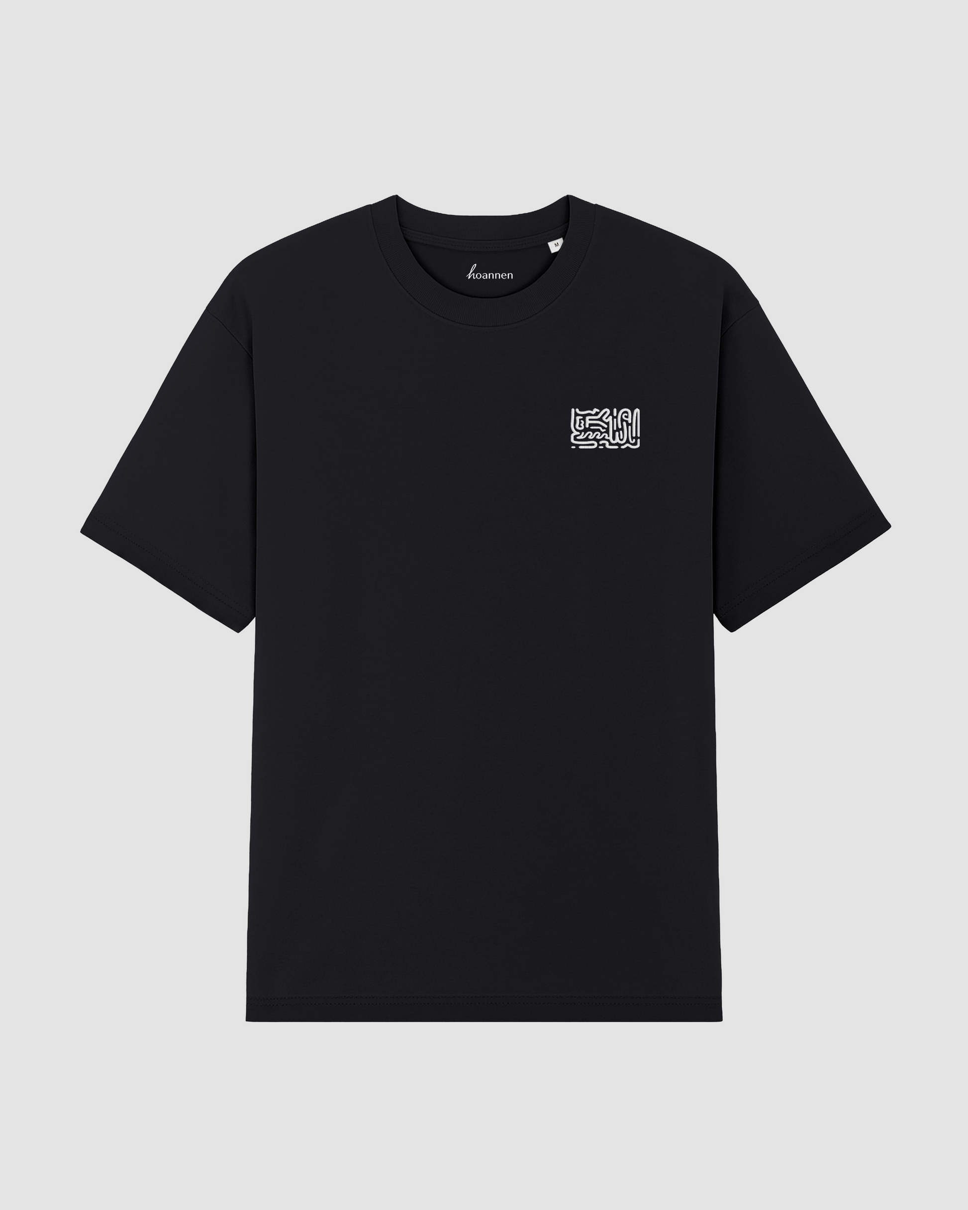 Flat lay of black oversized t-shirt with chest embroidery