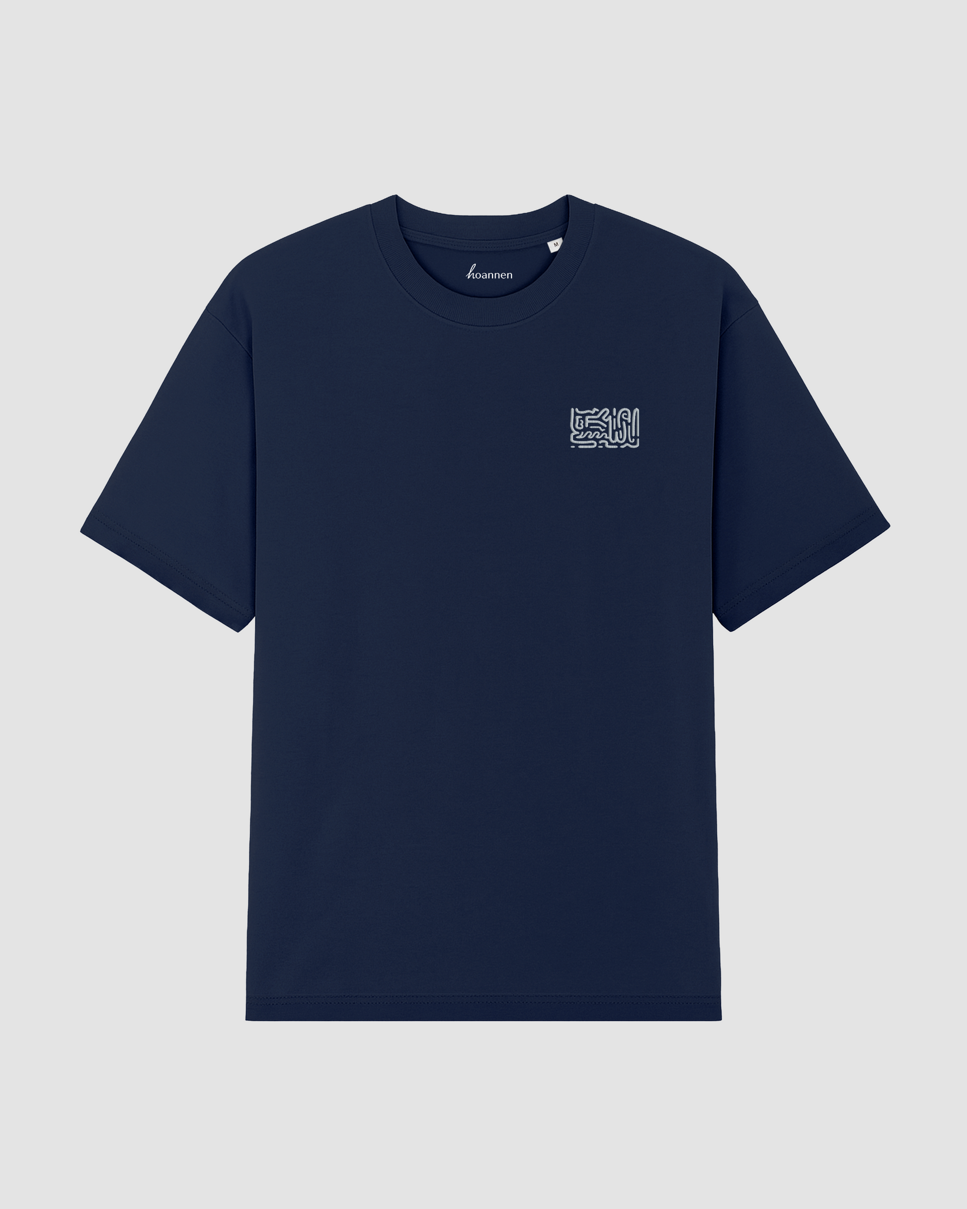 Flat lay of midnight blue oversized t-shirt with light blue embroidery on chest