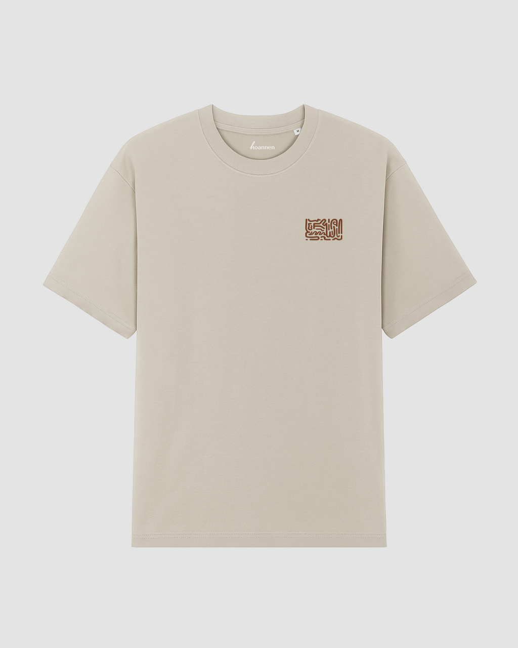 Flat lay of sand stone oversized t-shirt featuring embroidery on the chest